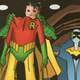 Illustration for article titled A Celebration of Superheroes Staring at Costumes in Fancy Display Cases